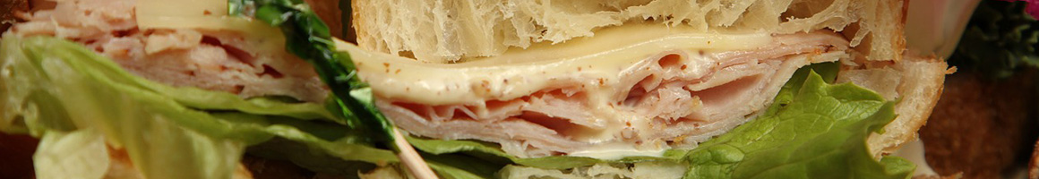 Eating American (Traditional) Breakfast & Brunch Sandwich at NY Deli & Bagels - Alpharetta restaurant in Alpharetta, GA.